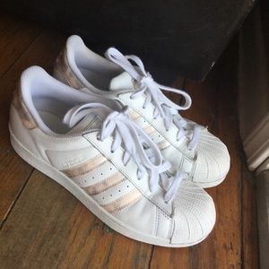 White Adidas with pink and grey sides